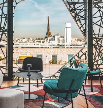 rooftop bar with a view of the eiffel tower
