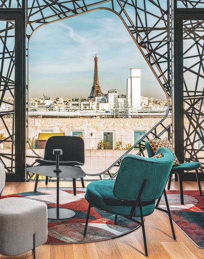 rooftop bar with a view of the eiffel tower