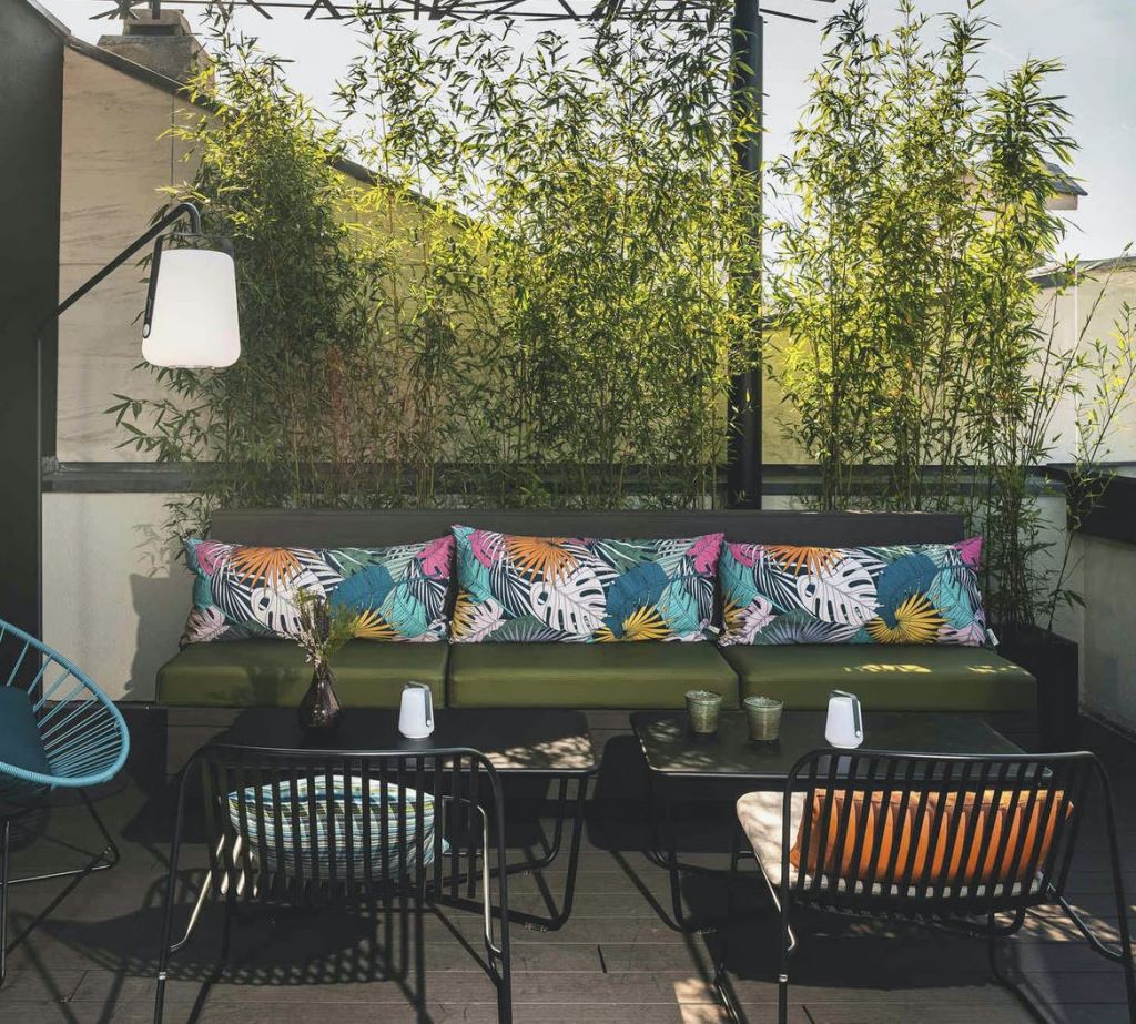 rooftop bar in paris with a view of the Eiffel tower
